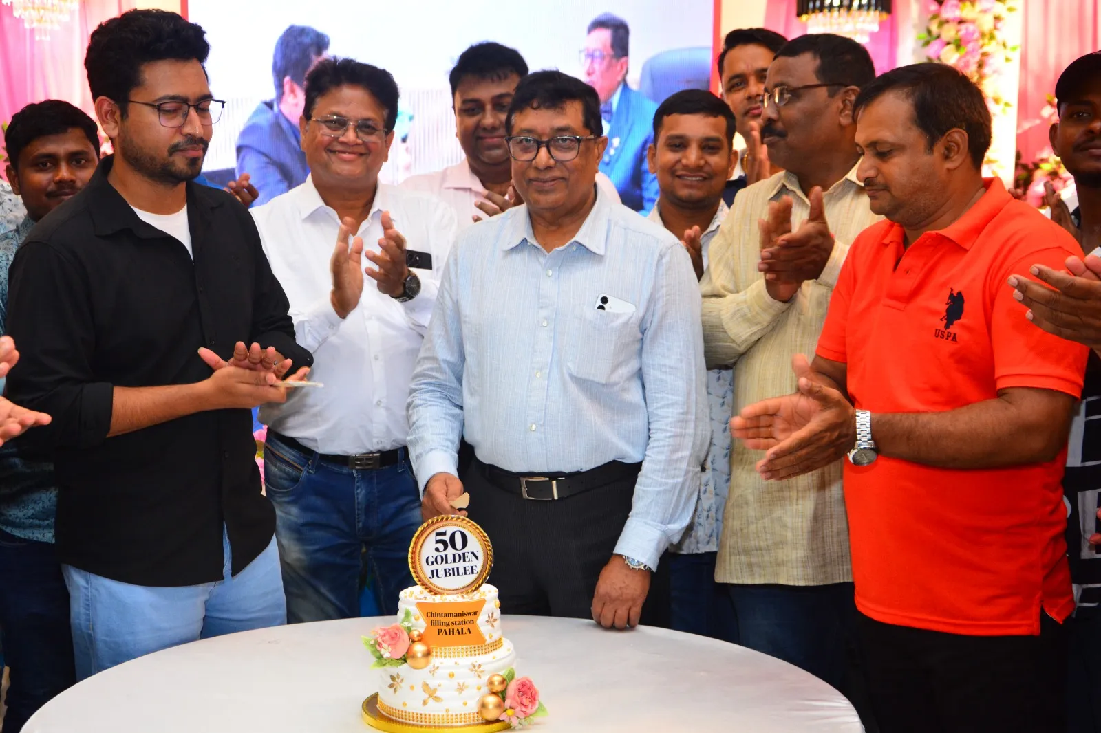 Cake cutting ceremony for the Golden Jubilee of Chintamaniswar Filling Station, Pahala