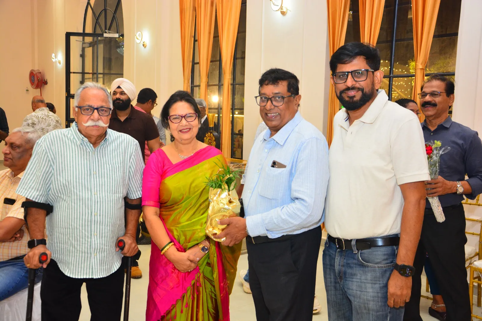 Guests greeting the proprietor and his wife at the Golden Jubilee celebration